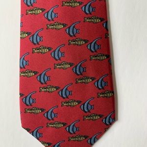 Authentic French handmade Hermes silk neck tie in muted red with fish print